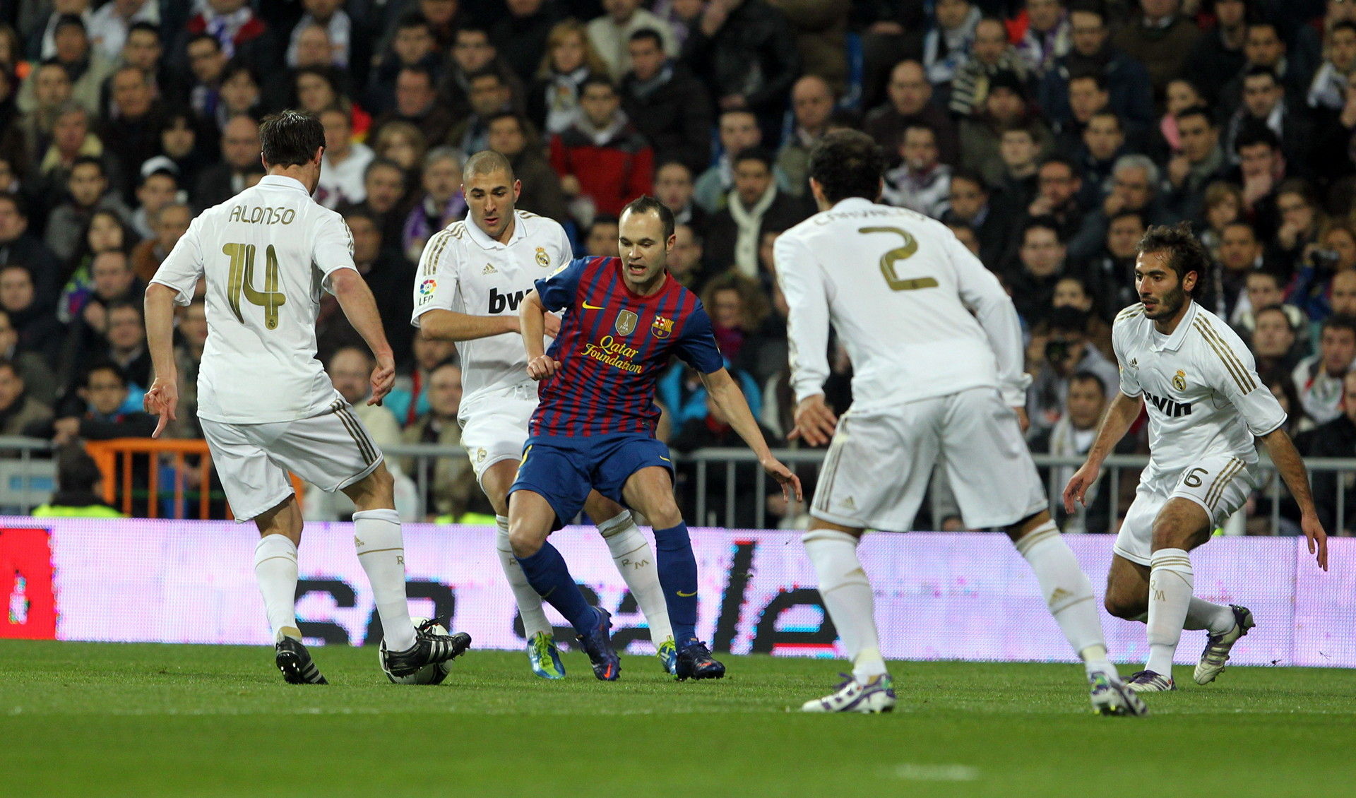 Iniesta surrounded by players of Real Madrid, Czech Republic, Croatia ...